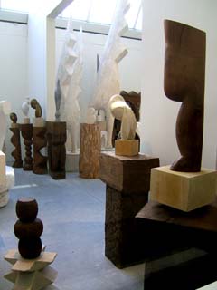 several sculptures on sculpted bases.  Some of the forms are repeated in various materials or sizes.