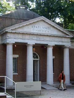 Jeffersonian style interpretation of greek revival architecture of the 19th century (red bricks, white colonades, arched windows).